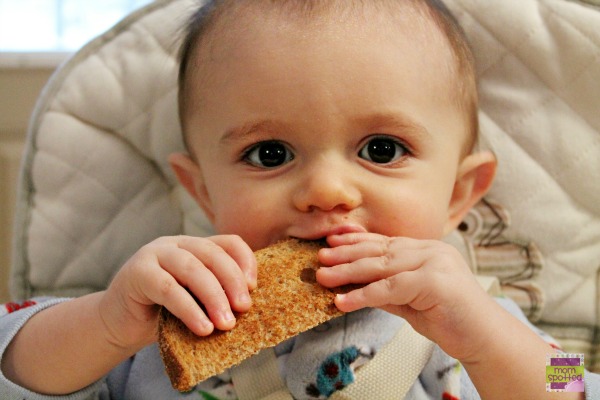 Sawyer James eating toast 10 months  #momspotted