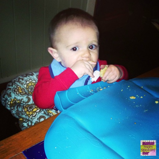 Sawyer in high chair cover and table placemat