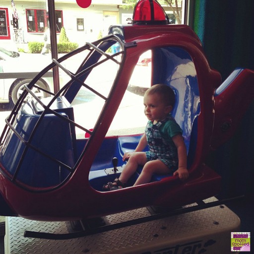 Sawyer's 1st arcade ride helicopter 