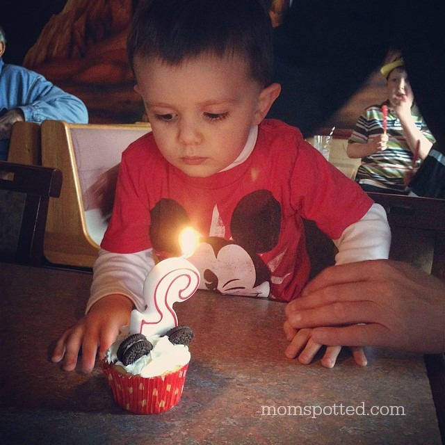 Mickey & Minnie Mouse Cupcakes {Sawyers 2nd Birthday Party} #momspotted Blowing out candle