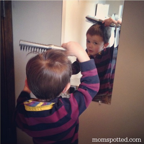 Sawyer James brushing his hair