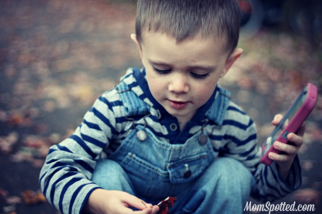 Sawyer James searching for leaves on the bike trail