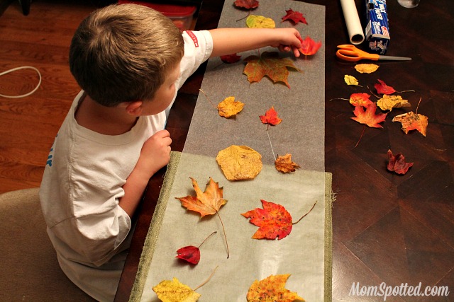 Stained Glass from Wax Paper Leaves {Easy Autumn Craft Tutorial} #FunCraftsWithMom #KidsCraft #Fall #Leaves momspotted.com