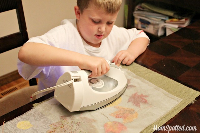 Stained Glass from Wax Paper Leaves {Easy Autumn Craft Tutorial} #FunCraftsWithMom #KidsCraft #Fall #Leaves momspotted.com