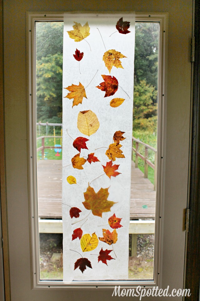 Stained Glass from Wax Paper Leaves {Easy Autumn Craft Tutorial} #FunCraftsWithMom #KidsCraft #Fall #Leaves momspotted.com