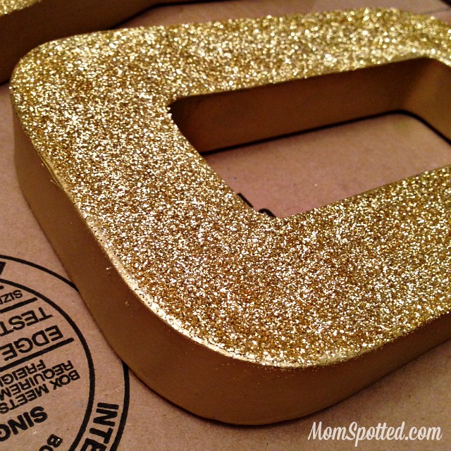 Make Your Own Gold Glittery Christmas Letter Decoration tutorial found on momspotted.com glitter, modge podge, christmas decor