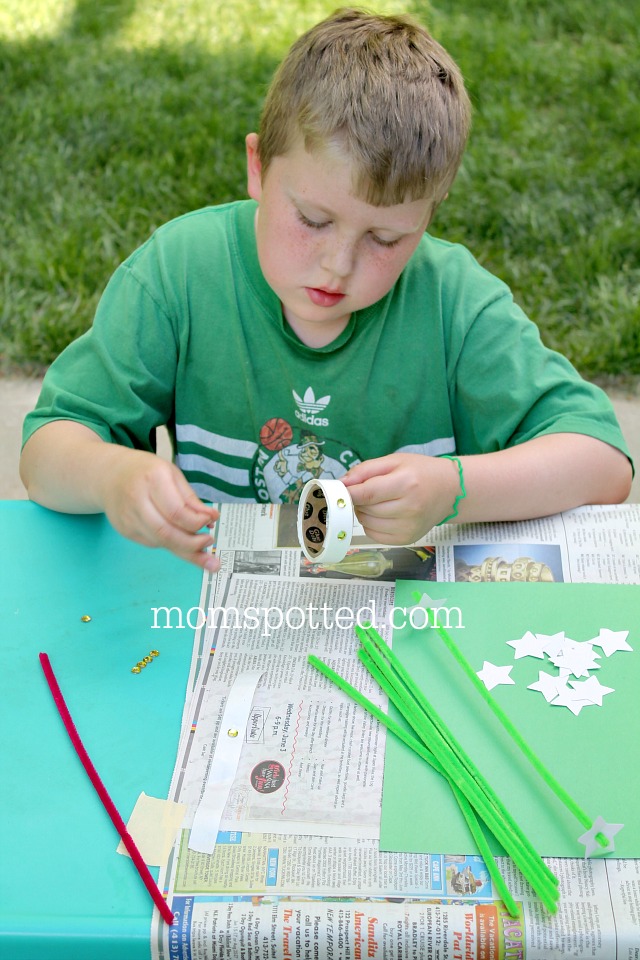 Gavin making the Mayflower - A Massachusetts State Flower Craft 