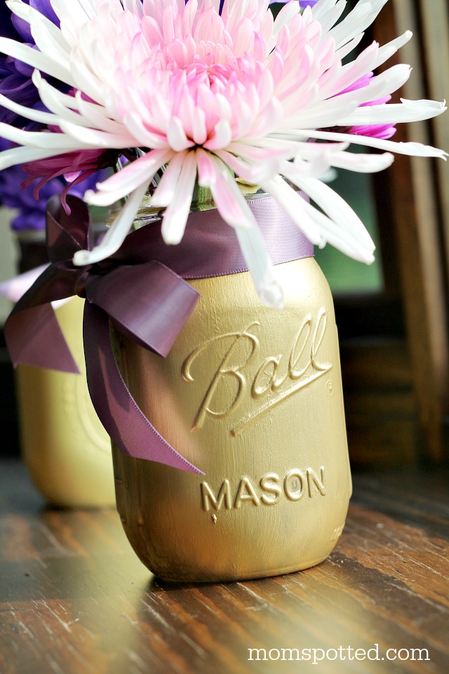 DIY Painted Mason Jar Flower Vases! These are great for wedding, baby showers, and even as home decor! Find directions on momspotted