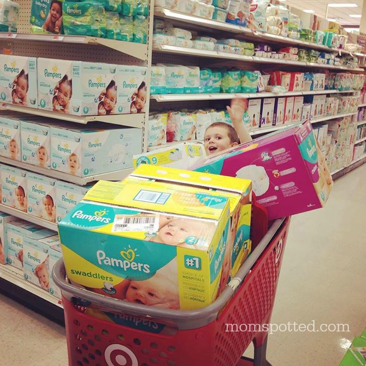 Sawyer James shopping for Pampers Dipaers